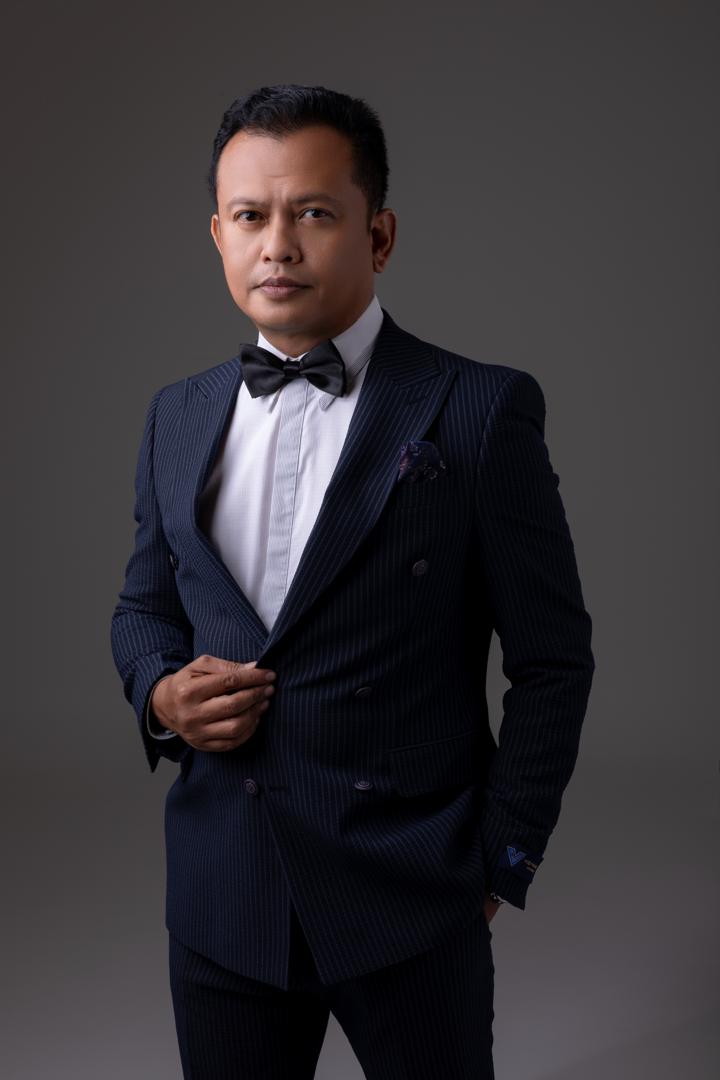 Coach Adi